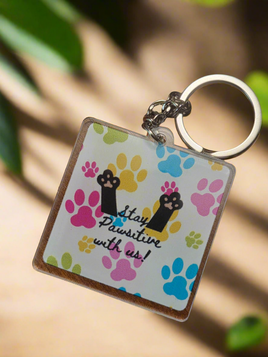 Stay Pawsitive with us keychain
