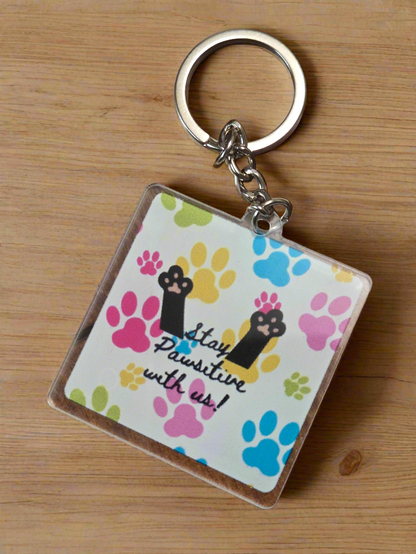 Stay Pawsitive with us keychain